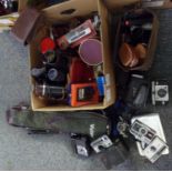Box of cameras and camera equipment to include: cased tripod, cameras: Helina Anastigmat 35X,