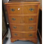 Reproduction yew wood serpentine chest of four drawers on projecting base with bracket feet. (B.P.