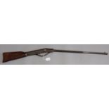 Vintage break action air rifle with half octagonal barrel and simulated walnut stock. Un-named. Over