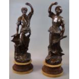 Pair of early 20th Century French spelter figurines on wooden bases. (B.P. 21% + VAT)