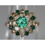 9ct gold green and white stone cluster ring. Ring size N. Approx weight 3 grams. (B.P. 21% + VAT)