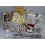 Collection of silver and costume jewellery including a pair of 1930s silver and paste long