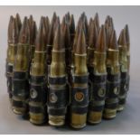 A belt of .75 blank Machine Gun cartridges with bullets. (B.P. 21% + VAT)