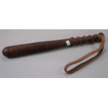 Vintage turned wooden truncheon with leather strap. (B.P. 21% + VAT)