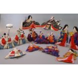 Group of Japanese fabric and card miniature theatre figures, including: warriors, Geisha and other