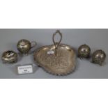 Indian white metal condiment set, having two pepperettes, open salt and lidded mustard on a clover