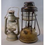 Vintage Tilley lamp, together with a hanging oil burner marked 'Made in China'. (2) (B.P. 21% + VAT)