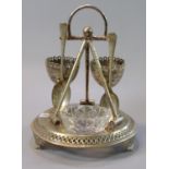 Novelty silver plated cruet set, the stand decorated with crochet or polo sticks. (B.P. 21% + VAT)