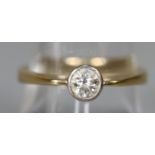 18ct gold and diamond solitaire ring. Ring size Q. Approx weight 3.7 grams. (B.P. 21% + VAT)
