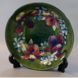 Moorcroft art pottery tube lined 'Feathered Orchid' pedestal bowl. 26cm diameter and 9cm high