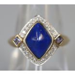 9ct gold lapis lazuli and diamond dress ring. Ring size N. Approx weight 2.8 grams. (B.P. 21% + VAT)