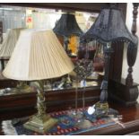 Two modern table lamps, one in bronze finish standing on paw feet, together with a pair of modern