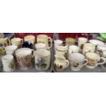 Two trays of commemorative pottery mugs, tankards and cups to include: Marriage of Andrew & Sarah,