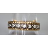 9ct gold and white stone eternity style ring (two stones missing). Ring size S. Approx weight 3.3