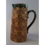 Late 19th Century Doulton Burslem stoneware tapering single handled jug with mottled foliate