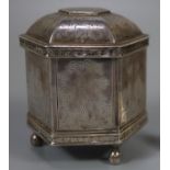 20th century white metal octagonal shaped box with domed cover, overall engraved with religious