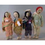 A group four Indian fabric figures with traditional dress and painted features. (4) (B.P. 21% + VAT)