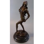 After Aldo Vitaleh bronze figure of a nude female on rockwork base with marble plinth. 25cm high