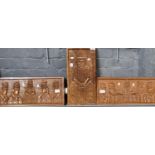 Group of three African carved panels, probably depicting Benin figures. (3) (B.P. 21% + VAT)