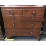 19th century oak straight front chest of two short and three long drawers on bracket feet. (B.P. 21%