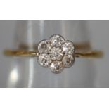 18ct gold diamond daisy cluster ring. Ring size N&1/2. Approx weight 2.2 grams. (B.P. 21% + VAT)