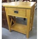 Modern oak single drawer lamp or side table with under tier, together with a mid century oak