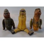 Three unusual vintage celluloid animals to include: bear, hare and bulldog dressed as a police