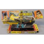 Original Corgi toys rocket firing Batmobile, with original box in distressed condition. (B.P.