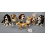 Collection of china dogs to include: Sylvac Corgi, Sylvac hound, bulldog, spaniels etc. (7) (B.P.