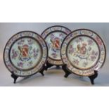 A set of three late 19th Century French Samson porcelain cabinet plates with armorials, flowers