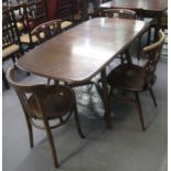 Ercol elm dining/kitchen table with 'X' frame support, together with three matching Ercol kitchen