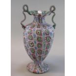 Murano design multi coloured millefiori two handled vase. 23cm high approx. (B.P. 21% + VAT)