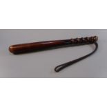 Early 20th century hardwood Police truncheon with ribbed grip and leather thong. 39cm long. (
