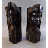 Pair of carved hardwood tribal bookends in the form of male bust. (2) (B.P. 21% + VAT)