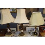 Pair of gilt finish classical design alabaster table lamps with shades, together with another modern