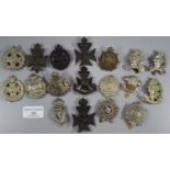 Collection of assorted British military cap badges, to include: Twelfth County of London Battalion