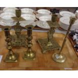 Five brass candlesticks: one pair of small candlesticks with pushers, probably late 19th/early