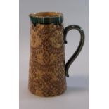 Late 19th Century Doulton Burslem stoneware tapering single handled jug with mottled foliate