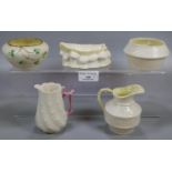 Collection of five Belleek Irish porcelain items: jugs, boat shaped dish etc. (5) (B.P. 21% + VAT)