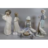 Three Lladro porcelain figurines, to include: angel and girls with geese together with a Spanish