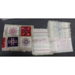 Box of unusual and good quality table linen to include: two tablecloths with embroidered squares