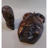 Carved hardwood tribal bust of a male together with another tribal carved hardwood mask. (2) (B.P.