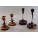 A pair of delicately turned hardwood candlesticks, probably rosewood and coromandel. 17.5cm approx