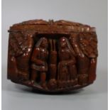 Unusual carved Coquilla nut snuff box decorated with figures and bust to the reverse, appearing to