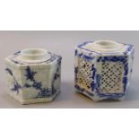 Two Japanese blue and white porcelain moulded and reticulated ink wells. un-marked. 8cm high and 6.