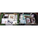 Two boxes containing mostly christening sets and other celebratory items including: picture