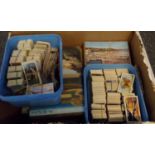 Box of postcards: Swansea, Gower, Mumbles etc. in packs with duplication plus two tubs of Tea cards,