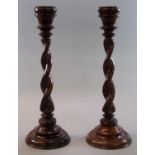 Pair of 20th century oak barley sugar twist candle sticks with turned sconces and turned conical