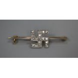 Unmarked gold diamond set swastika pin brooch. (Despite its Nazi connotations, the swastika is
