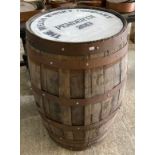 Early 20th century oak coopered barrel with iron banding, the top marked 'The Welsh Whisky Company